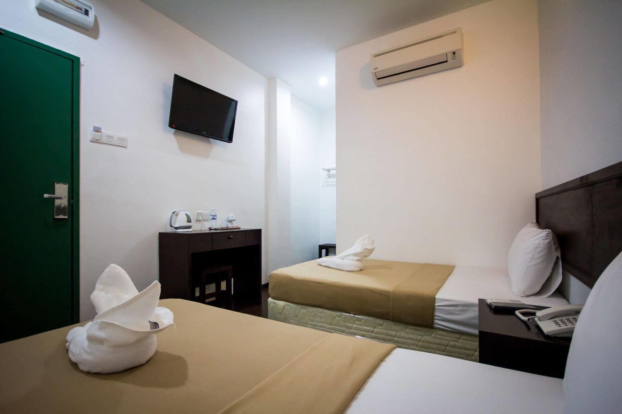G Times Inn Hotel จอร์จทาวน์ ภายนอก รูปภาพ
